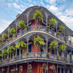 Balconies with hanging ferns on Bourbon Street in New Orleans